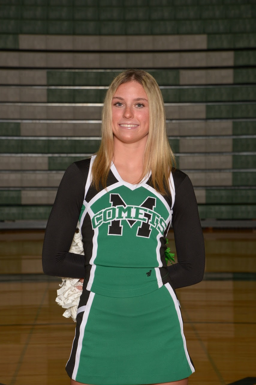 Madi is a junior on the Mason Winter Cheer Team.